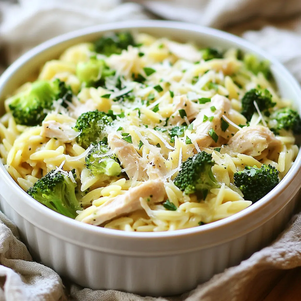 - 1 cup orzo pasta - 2 cups chicken broth - 1 cup cooked chicken, shredded - 1 cup broccoli florets - 1/2 cup heavy cream - 1/2 teaspoon garlic powder - 1/2 teaspoon onion powder - 1/4 teaspoon red pepper flakes (optional) - Salt and pepper to taste - 2 tablespoons olive oil - 1/4 cup grated Parmesan cheese - Fresh parsley for garnish In this recipe, we use simple, wholesome ingredients. The orzo pasta cooks quickly and gives a nice texture. The chicken broth adds depth to the dish and keeps it moist. Shredded chicken makes it hearty, while broccoli adds color and nutrition. The heavy cream turns this meal into a creamy delight. Garlic and onion powders boost flavor, and red pepper flakes add a hint of heat. You can adjust the salt and pepper to fit your taste. Olive oil helps sauté the broccoli and adds richness. Finally, grated Parmesan cheese gives a savory finish. Fresh parsley not only brightens the dish but also adds a fresh touch. Each ingredient plays a role in creating a tasty one-pot meal that is both comforting and satisfying. {{ingredient_image_1}} To start, grab a large pot. Pour in 2 cups of chicken broth and bring it to a boil. Once it bubbles, add 1 cup of orzo pasta. Cook the orzo according to the package directions. This usually takes about 8 to 10 minutes. You want the orzo to be tender but not mushy. While the orzo cooks, take a skillet and heat 2 tablespoons of olive oil over medium heat. Next, add 1 cup of broccoli florets. Sauté them for about 3 to 4 minutes. You want them to turn bright green and become slightly tender. Then, mix in 1 cup of shredded chicken. Stir it well so the chicken warms up. Once the orzo is cooked, drain it carefully. Add the drained orzo to the skillet with the chicken and broccoli. Now, pour in 1/2 cup of heavy cream. Sprinkle in 1/2 teaspoon of garlic powder, 1/2 teaspoon of onion powder, and 1/4 teaspoon of red pepper flakes if you like a little heat. Stir everything together until well combined. Let it simmer on low heat for 2 to 3 minutes. This helps the flavors meld together and makes the sauce creamy. Finally, season with salt and pepper to taste. Stir in 1/4 cup of grated Parmesan cheese until it melts and gives a rich flavor. Enjoy your meal! To thicken the sauce, let it simmer longer. The cream thickens as it cooks. You can also add extra cheese. Parmesan cheese melts well and adds great flavor. If you need substitutions, use low-fat milk instead of heavy cream. Coconut milk is a great dairy-free option. You can swap orzo for rice or quinoa if you prefer. Serve Creamy Chicken Broccoli Orzo in deep bowls. It looks great drizzled with cream and topped with extra cheese. Add fresh parsley on top for a pop of color. For a fun twist, serve it with garlic bread or a fresh salad. This adds crunch and balance to the meal. You can also use a sprinkle of red pepper flakes for a little heat. Pro Tips Perfectly Cooked Orzo: Be sure to stir the orzo occasionally while it cooks to prevent it from sticking together. Flavor Boost: For extra depth of flavor, consider adding a splash of white wine to the skillet when sautéing the broccoli. Make It Cheesy: Feel free to experiment with different types of cheese, such as mozzarella or gouda, to give the dish a unique twist. Storage Tips: This dish can be stored in an airtight container in the fridge for up to 3 days. Reheat gently on the stove with a splash of chicken broth to restore creaminess. {{image_2}} You can change the proteins in Creamy Chicken Broccoli Orzo easily. Shrimp adds a nice touch. Tofu is a great option for a plant-based meal. Both add unique flavors and textures. You can also mix in different veggies. Bell peppers give the dish a crunchy bite. Spinach adds color and nutrients. Feel free to use whatever veggies you love. Just remember to cook them until tender. Changing the cheese can bring new life to this meal. Try using sharp cheddar for a stronger taste. Cream cheese can make it extra rich and creamy. Each type of cheese brings its own fun flavor. Adding herbs and spices can enhance the taste. Fresh basil or thyme adds a bright note. A pinch of lemon zest can wake up the flavors. Don't be afraid to get creative with what you have at home. To store your Creamy Chicken Broccoli Orzo, let it cool first. Then, place it in an airtight container. This helps keep it fresh. You can store it in the fridge for up to three days. Be sure to label it with the date. If you want to keep it longer, freeze it for up to two months. Just remember, freezing may change the texture a bit. When reheating, you want to keep it creamy. The best way is to use a skillet. Add a splash of chicken broth or cream. Heat it over low heat, stirring gently. This helps maintain the rich texture. You can also use the microwave, but cover it to avoid drying out. Reheat in short bursts, stirring often. Enjoy your meal warm and creamy! What can I use instead of orzo? If you can't find orzo, try using small pasta like ditalini or acini di pepe. Rice or quinoa also works well if you want a gluten-free option. Just adjust cooking time based on what you choose. How can I make this recipe dairy-free? To make this dish dairy-free, swap heavy cream for coconut milk or a dairy-free cream. Use nutritional yeast instead of Parmesan cheese for a cheesy flavor without dairy. Can I prepare this dish in advance? Yes, you can make this dish ahead of time. Cook it, cool it, and store it in the fridge for up to three days. Reheat gently on the stove with a splash of broth or water to keep it creamy. What goes well with Creamy Chicken Broccoli Orzo? Serve this dish with a simple green salad or crusty bread. A light vinaigrette adds a fresh touch. You can also pair it with roasted vegetables for extra color and flavor. You learned how to make Creamy Chicken Broccoli Orzo with simple ingredients and steps. This dish is tasty and easy to customize. You can use different proteins or veggies for variety. Remember, storing leftovers correctly helps keep the flavors fresh. Enjoy this dish with your family or friends. Try the tips for a creamy texture and great presentation. You'll impress everyone at your dinner table. Happy cooking!