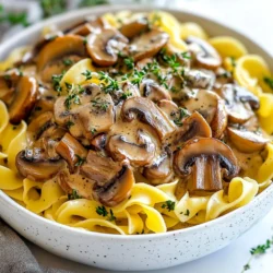For the creamy mushroom stroganoff, you need: - 1 pound mixed mushrooms (cremini, shiitake, and button), sliced - 1 medium onion, finely chopped - 3 cloves garlic, minced - 1 cup vegetable broth - 1 cup sour cream (or Greek yogurt for a healthier option) - 2 tablespoons olive oil - 2 tablespoons soy sauce - 1 tablespoon Dijon mustard - 1 teaspoon dried thyme - 1 teaspoon paprika - Salt and pepper to taste - 8 ounces egg noodles or pasta of choice - Fresh parsley, chopped (for garnish) These ingredients work together to create a rich, creamy sauce that pairs perfectly with pasta. The mushrooms give it a great texture and flavor. The sour cream adds creaminess, while the Dijon mustard brings a nice tang. You can add some optional ingredients for extra flavor: - A splash of white wine for depth - Fresh herbs like thyme or rosemary for a pop of freshness - A pinch of red pepper flakes for a hint of heat Feel free to get creative! Adding these ingredients can make your dish even more special. This recipe can fit many diets: - Use Greek yogurt instead of sour cream for a lighter touch. - For a vegan version, swap sour cream with cashew cream or vegan yogurt. - If you're gluten-free, choose gluten-free pasta. These options help you to enjoy this delicious meal, no matter your dietary needs. {{ingredient_image_1}} Start by boiling a large pot of salted water. Make sure the water is bubbling. Add your egg noodles or pasta of choice. Cook them according to the package instructions. You want them to be al dente, which means firm but not hard. This usually takes around 8-10 minutes. Once they are done, drain the noodles and set them aside. In a big skillet, heat two tablespoons of olive oil over medium heat. Add one medium onion, finely chopped. Stir in three minced garlic cloves. Sauté these for about 3-4 minutes. You want the onion to become clear and soft. Next, add one pound of mixed mushrooms, sliced. You can use cremini, shiitake, or button mushrooms. Cook them for about 8-10 minutes. They should turn brown and release their moisture. Now it’s time to create the sauce. Add one cup of vegetable broth to the skillet. Pour in two tablespoons of soy sauce and one tablespoon of Dijon mustard. Sprinkle in one teaspoon of dried thyme and one teaspoon of paprika. Stir everything well and let it simmer for about 5 minutes. This helps the flavors blend and the sauce to thicken slightly. After that, lower the heat and take the skillet off the burner. Stir in one cup of sour cream or Greek yogurt. Mix until the sauce is smooth and creamy. Taste it and add salt and pepper if you like. Finally, it’s time to combine everything. Add the cooked egg noodles to the skillet. Toss them in the creamy mushroom sauce until they are fully coated. This is where all the flavors come together. Serve the stroganoff in bowls and garnish with chopped fresh parsley. Enjoy your easy and comforting meal! To cook mushrooms well, always start with dry ones. Wet mushrooms don’t brown nicely. Use a mix of cremini, shiitake, and button mushrooms for great flavor. Slice them evenly for even cooking. Heat your skillet before adding oil. This helps mushrooms brown and adds depth. Sauté them until they’re golden and release moisture. Don't rush this step; it takes about 8-10 minutes. For a rich sauce, use sour cream or Greek yogurt. Both give a creamy texture. Add them off the heat to keep them smooth. The combination of soy sauce and Dijon mustard adds umami. Don’t forget the dried thyme and paprika; they boost flavor. Taste your sauce and adjust with salt and pepper. Garnish your stroganoff with fresh chopped parsley. It adds color and freshness. You can also use a sprinkle of paprika for extra flair. If you love crunch, add some toasted nuts on top. This will give your dish a nice texture contrast. Enjoy your creamy mushroom stroganoff with these simple tips! Pro Tips Use Fresh Mushrooms: Fresh mushrooms enhance the flavor and texture of your stroganoff. Opt for a mix of varieties for a more complex taste. Adjust the Creaminess: For a lighter dish, substitute sour cream with Greek yogurt. This keeps it creamy while reducing calories. Herb Variations: Experiment with fresh herbs like dill or chives for a unique twist. They can elevate the flavor profile of your stroganoff. Perfect Pasta Pairing: While egg noodles are classic, feel free to try whole grain or gluten-free pasta to suit your dietary preferences. {{image_2}} You can easily make this dish vegetarian. Use vegetable broth instead of chicken broth. The mushrooms give a rich flavor, so add extra types if you like. You can use tofu instead of meat for added protein. Try adding spinach or kale for more greens. They blend well with the creamy sauce. If you need a gluten-free meal, swap the egg noodles for gluten-free pasta. Look for options made from rice or quinoa. Make sure your soy sauce is gluten-free too. Many brands offer a gluten-free version. This way, you can enjoy the dish without worry. Want to boost the flavor? Consider adding a splash of white wine while cooking the mushrooms. This will give a nice depth to your sauce. You can also add fresh herbs like thyme or dill. They add freshness and bright notes to the dish. A pinch of red pepper flakes can add a nice kick. Adjust the flavors to suit your taste. To store your creamy mushroom stroganoff, let it cool first. Then, place it in an airtight container. It will keep well in the fridge for up to three days. Make sure to label the container with the date. This way, you can keep track of how long it’s been stored. When you’re ready to enjoy leftovers, use a skillet for best results. Heat the skillet over medium-low heat. Add the stroganoff and a splash of vegetable broth to keep it creamy. Stir often until it's warm. You can also use a microwave. Heat in short bursts, stirring in between. This helps prevent hot spots and keeps the dish tasty. If you want to freeze stroganoff, it’s best to do this before adding sour cream. Use a freezer-safe container or bag. It can last for about two months in the freezer. When you’re ready to eat, let it thaw in the fridge overnight. After thawing, heat it up and stir in the sour cream. This keeps the sauce creamy and fresh. You can use Greek yogurt instead of sour cream. It adds creaminess and tang. Plain yogurt also works well. It keeps the dish rich but is lower in fat. You can also try cashew cream for a dairy-free option. Yes, you can make this recipe ahead of time. Cook the stroganoff and cool it down. Store it in the fridge for up to three days. When ready to eat, just reheat it gently on the stove. Add a splash of broth if it seems too thick. To make this stroganoff vegan, replace sour cream with cashew cream or tofu. Use vegetable broth and soy sauce as in the recipe. Make sure your pasta is egg-free. You will still enjoy a creamy and tasty dish. Egg noodles are great for stroganoff, but other pastas work too. Try fettuccine, pappardelle, or even penne. The key is to choose pasta that holds sauce well. Thicker noodles cling to the creamy sauce nicely. Creamy mushroom stroganoff can be a healthy option. It has mushrooms, which are low in calories and high in nutrients. Using Greek yogurt instead of sour cream lowers fat. Pair it with whole-grain pasta for more fiber. Enjoy it in moderation for a balanced meal. In this blog post, we covered the key ingredients for creamy mushroom stroganoff and provided step-by-step instructions for a successful dish. We shared useful tips for cooking, as well as variations for different diets. Remember, you can store leftovers easily and reheat them without losing flavor. I hope this guide helps you create a delicious meal. Enjoy your cooking and feel free to get creative with flavors and ingredients. Happy cooking!
