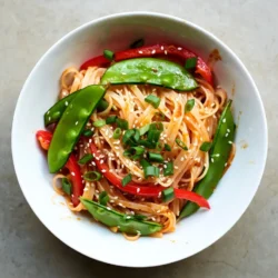 - 300g of rice noodles - 3 tablespoons sweet chili sauce - 2 cloves garlic, minced - 1 tablespoon soy sauce - 1 bell pepper, sliced (red or yellow) - 1 cup snap peas, trimmed - 2 green onions, sliced - 1 tablespoon sesame oil - 1 tablespoon sesame seeds - Salt and pepper to taste When I make Sweet Chili Garlic Noodles, I love to start with the main ingredients. The rice noodles are key. They soak up the sauce well and add a nice texture. Sweet chili sauce brings that perfect balance of sweet and spicy. I always add minced garlic for a punch of flavor, along with soy sauce for depth. Next, I pick fresh vegetables. A bell pepper adds color and crunch. Red or yellow works well; both taste great. I also use snap peas, which add a nice snap. Sliced green onions are a must for freshness and a little zing. For seasoning, I use sesame oil to give a nutty flavor. It makes the dish richer. Sesame seeds are great as a garnish; they add a nice look and extra crunch. Finally, salt and pepper finish it off, bringing all the flavors together. {{ingredient_image_1}} To cook rice noodles al dente, start by boiling water in a large pot. Add the noodles and cook according to the package instructions, usually 5 to 7 minutes. You want them soft but with a slight bite. Once they are done, drain them and rinse under cold water. This stops the cooking process and keeps them from sticking. Set the noodles aside. Next, grab a large skillet or wok. Heat the sesame oil over medium heat. This oil adds a nice nutty flavor. Once hot, add 2 cloves of minced garlic. Sauté for about 1 minute until it smells great. Be careful not to let it burn. Then, add the sliced bell pepper and snap peas. Stir-fry for 3 to 4 minutes. You want the veggies tender but still crisp. Now it’s time to bring it all together. Pour in 3 tablespoons of sweet chili sauce and 1 tablespoon of soy sauce. Stir well to mix everything. Let the sauce simmer gently for a minute. Then, add the cooked rice noodles to the skillet. Toss everything together until the noodles are coated with sauce. Season with salt and pepper to taste. When it’s all heated through, remove from heat. Sprinkle sliced green onions and sesame seeds on top. Toss gently again. Your savory sweet chili garlic noodles are ready to serve hot! To make perfect noodles, cook them until they are al dente. This means they should be firm to the bite. Overcooking will make them mushy. After cooking, rinse the noodles under cold water. This stops the cooking and keeps them from sticking. When it comes to storing leftover noodles, place them in an airtight container. They can last in the fridge for up to three days. To reheat, use a pan with a bit of water. This helps keep them moist. To boost flavor, consider adding more sauces. Hoisin sauce or a splash of lime juice works great. You can also try adding a pinch of red pepper flakes for heat. Fresh herbs enhance the dish too. Cilantro or basil adds a nice touch when you garnish your noodles. One common mistake is burning the garlic. Garlic cooks quickly, so watch it closely. If it burns, it will taste bitter. Stir it often and remove it from heat once it’s fragrant. Another mistake is overcooking vegetables. They should be tender-crisp. This keeps them bright and fresh. Stir-fry them just until they are vibrant and still have a bite. Pro Tips Use Fresh Ingredients: Fresh vegetables not only enhance the flavor but also add a vibrant color to the dish. Always choose crisp and colorful produce for the best results. Adjust the Spice Level: If you prefer your noodles spicier, consider adding a dash of Sriracha or red pepper flakes when you mix in the sweet chili sauce. Perfectly Cooked Noodles: To achieve the best texture, cook the rice noodles just until al dente, as they will continue to soften when mixed with the hot sauce and vegetables. Garnish for Flavor: Adding fresh cilantro or a squeeze of lime juice as a garnish will elevate the dish and provide a refreshing contrast to the sweet chili sauce. {{image_2}} You can easily boost the flavor of Sweet Chili Garlic Noodles by adding protein. Shrimp and chicken work great here. To use shrimp, cook them until they turn pink. Toss them in with the garlic. For chicken, cut it into small pieces and stir-fry until it’s fully cooked. If you prefer a vegetarian option, tofu is a fantastic choice. Use firm tofu, press it to remove extra water, and cut it into cubes. Sauté the tofu until golden brown before adding it to the noodles. This adds a nice texture and absorbs the sauce well. If you want to change up the veggies, there are many great swaps. Instead of bell peppers, you can use carrots or zucchini. These add a nice crunch and color. For snap peas, try green beans or broccoli florets. They cook well and add nutrients. Mixing in seasonal vegetables can also enhance the dish. Think of asparagus in spring or roasted pumpkin in fall. This keeps your meal fresh and exciting, no matter the season. If you need gluten-free noodles, rice noodles are the perfect choice. They are light and easy to digest. You can also look for gluten-free pasta made from rice or quinoa. For sauces, check labels for gluten-free soy sauce. You can also use tamari as a great alternative. It has a similar flavor and keeps your dish gluten-free. Enjoy these options without missing out on taste! To store Sweet Chili Garlic Noodles, let them cool down first. Place them in airtight containers. You want to keep the noodles fresh and tasty. Glass or plastic containers work great. Make sure to seal them well to avoid air. This helps prevent the noodles from drying out. When reheating, use a skillet or a microwave. For the skillet, add a splash of water and heat on low. Stir gently to warm the noodles evenly. In the microwave, heat in short bursts. This helps keep the noodles from getting soggy. Always check the heat to avoid overcooking. Yes, you can freeze Sweet Chili Garlic Noodles. To freeze, let them cool completely. Then, portion them into freezer-safe bags. Remove as much air as you can before sealing. For thawing, place them in the fridge overnight. Reheat them gently on the stove or in the microwave. This keeps them tasty and fresh. Sweet chili garlic noodles are a quick and tasty dish. They mix rice noodles with sweet chili sauce and garlic. The dish is colorful and bright. You see vibrant bell peppers, snap peas, and green onions. The sweet and savory sauce coats the noodles well. This comfort food is perfect for any meal. Yes, you can make these noodles ahead of time. Cook the noodles and veggies, then store them separately. Keep the sauce in a jar. When you are ready to eat, just combine everything. This way, the noodles stay fresh. You can store them in the fridge for up to three days. These noodles pair well with many sides. Here are some great options: - Grilled chicken for protein - Steamed broccoli for added greens - Crispy spring rolls for a crunchy touch - A light salad to balance the meal These sides will enhance your dining experience and make it even better. Sweet Chili Garlic Noodles bring together great flavors and textures. You learned the main ingredients, like rice noodles and fresh veggies. Cooking tips help you avoid mistakes and enhance taste. You can try different proteins or make it gluten-free. In conclusion, this dish is simple yet tasty. Feel free to customize it to fit your taste. Enjoy creating your own version of Sweet Chili Garlic Noodles and delight in satisfying meals at home.